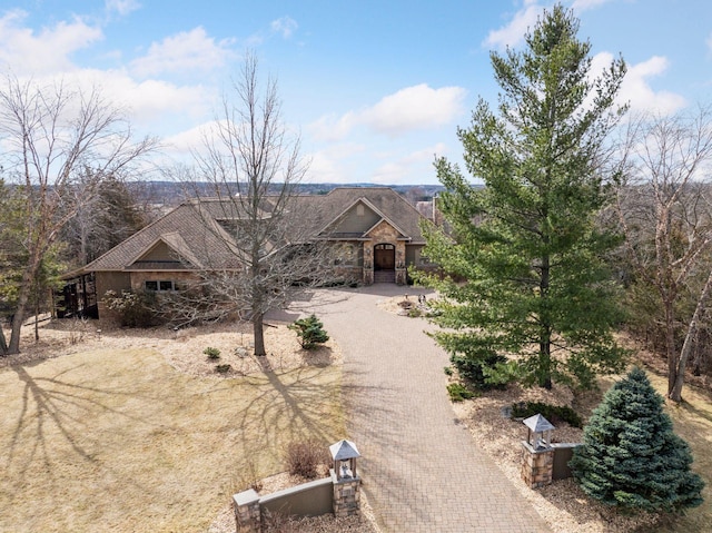 12159 Quail Avenue Ln N, Stillwater, MN 55082 - view of front of house with decorative driveway and stone siding