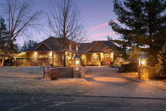 12159 Quail Avenue Ln N, Stillwater, MN 55082 - view of front of property featuring decorative driveway, a fenced front yard, and a gate