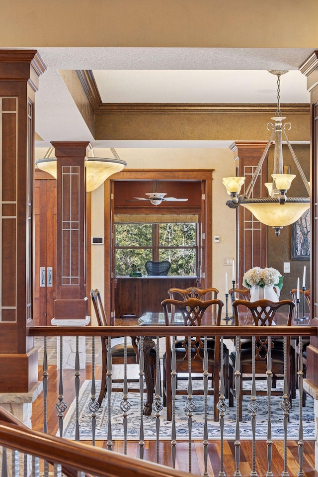 12159 Quail Avenue Ln N, Stillwater, MN 55082 - dining room with wood finished floors, ornamental molding, and ceiling fan