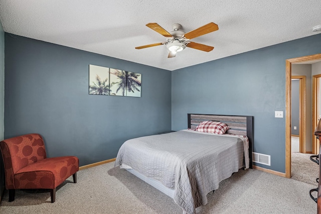 5392 Highland Trl, Big Lake, MN 55309 - carpeted bedroom with ceiling fan, baseboards, and a textured ceiling