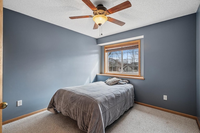 5392 Highland Trl, Big Lake, MN 55309 - bedroom featuring baseboards, carpet floors, a textured ceiling, and ceiling fan