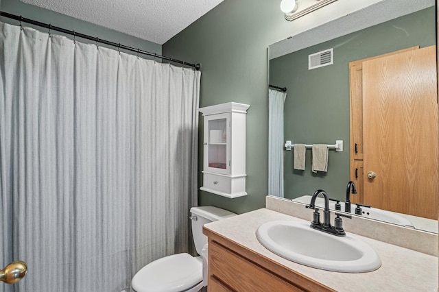 5392 Highland Trl, Big Lake, MN 55309 - full bath with toilet, a textured ceiling, and vanity