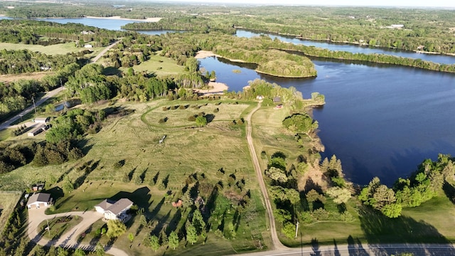 19663 County Road 9 NE, New London Twp, MN 56273 - aerial view of property's location with a large body of water and a heavily wooded area