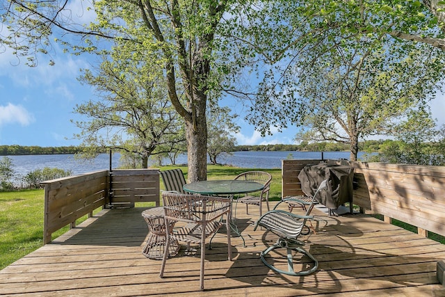 19663 County Road 9 NE, New London Twp, MN 56273 - wooden deck with a water view and a lawn