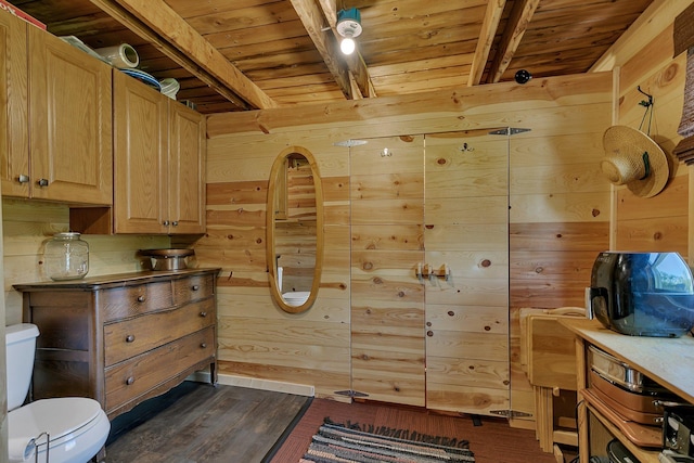 19663 County Road 9 NE, New London Twp, MN 56273 - bathroom featuring wooden walls, toilet, wooden ceiling with exposed beams, and wood finished floors
