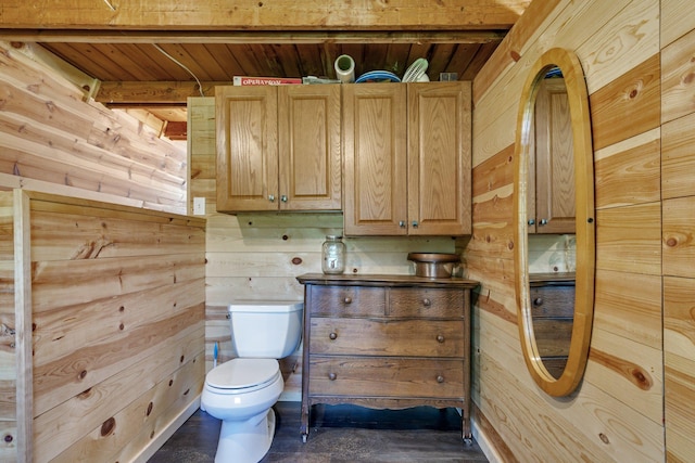 19663 County Road 9 NE, New London Twp, MN 56273 - bathroom featuring toilet, wooden walls, and wooden ceiling