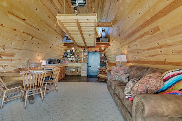 19663 County Road 9 NE, New London Twp, MN 56273 - carpeted dining space featuring wooden walls