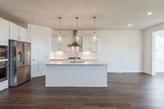 11452 Queens Ct N, Lake Elmo, MN 55042 - kitchen with appliances with stainless steel finishes, wall chimney range hood, a sink, dark wood-style flooring, and recessed lighting
