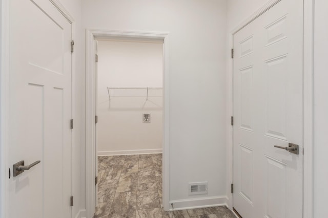 11452 Queens Ct N, Lake Elmo, MN 55042 - laundry room with baseboards