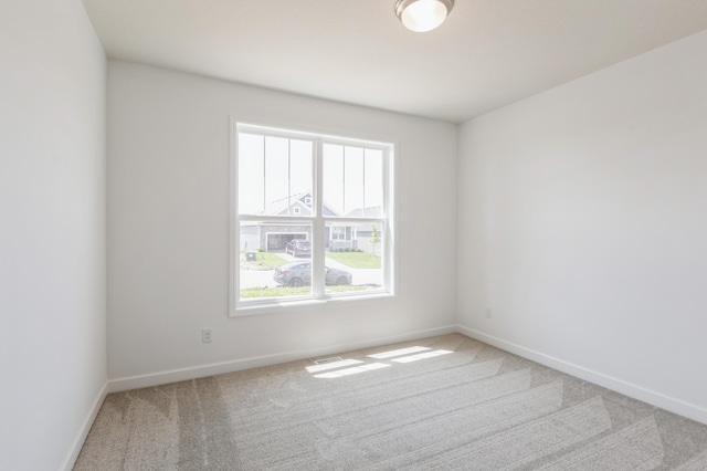 11452 Queens Ct N, Lake Elmo, MN 55042 - unfurnished room with carpet flooring and baseboards