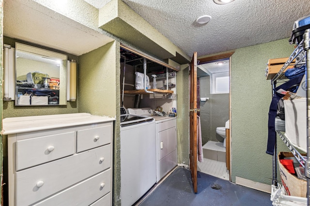 926 Bellows St, West Saint Paul, MN 55118 - washroom with washer and clothes dryer, a textured wall, and a textured ceiling