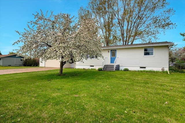 3003 Hammond Ave, Superior, WI 54880 - view of front of house with concrete driveway, a front lawn, crawl space, and an attached garage