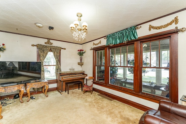 339 Cherry St E, Mazeppa, MN 55956 - living area featuring carpet floors, a chandelier, ornamental molding, and baseboards