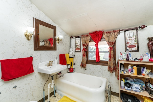 339 Cherry St E, Mazeppa, MN 55956 - full bath with a sink, a bath, and lofted ceiling