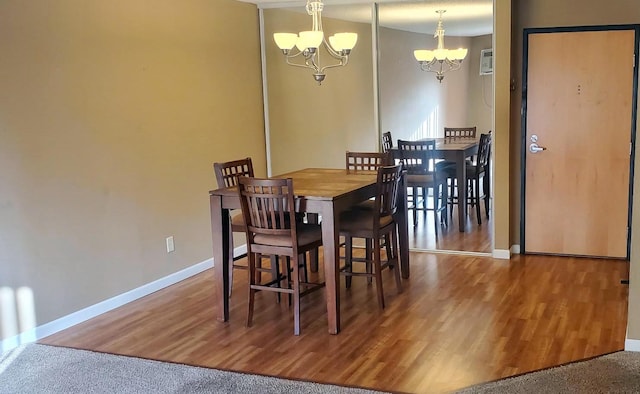 3155 Coachman Rd Unit 350, Eagan, MN 55121 - dining area featuring a chandelier and wood finished floors