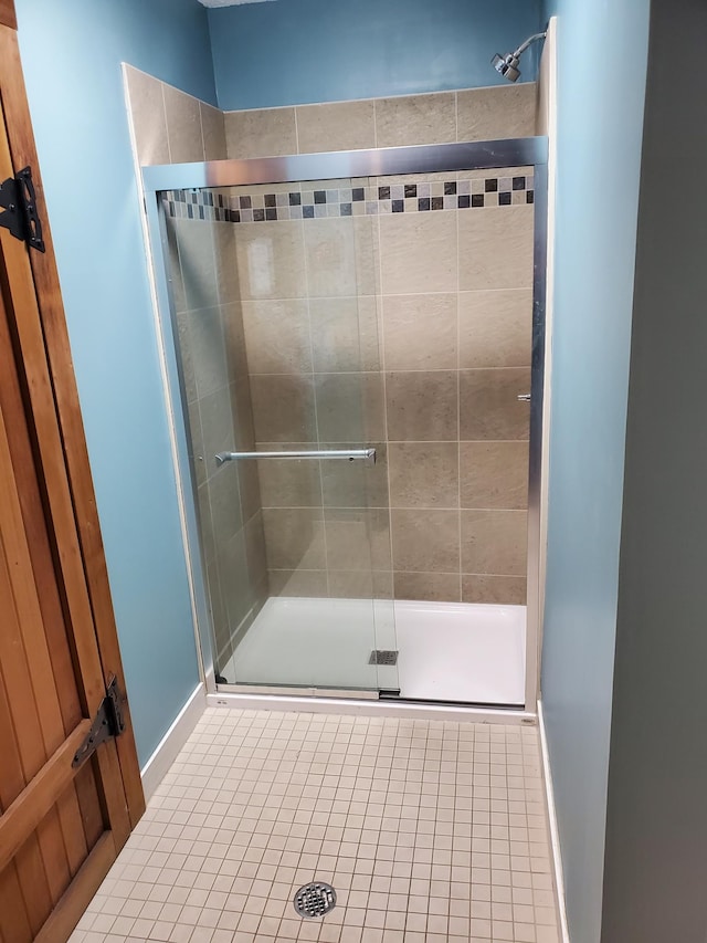 3155 Coachman Rd Unit 350, Eagan, MN 55121 - bathroom featuring a shower stall and tile patterned flooring