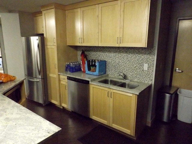 3155 Coachman Rd Unit 350, Eagan, MN 55121 - kitchen with stainless steel appliances, light countertops, decorative backsplash, light brown cabinetry, and dark wood-style flooring