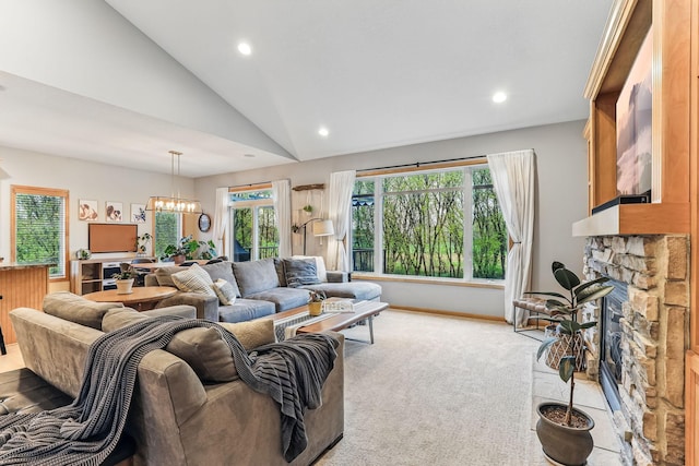 4828 Mason Ave NE, Saint Michael, MN 55376 - living area with a stone fireplace, lofted ceiling, a chandelier, recessed lighting, and healthy amount of natural light