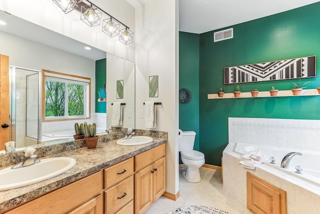 4828 Mason Ave NE, Saint Michael, MN 55376 - bathroom with toilet, a garden tub, a stall shower, double vanity, and tile patterned floors