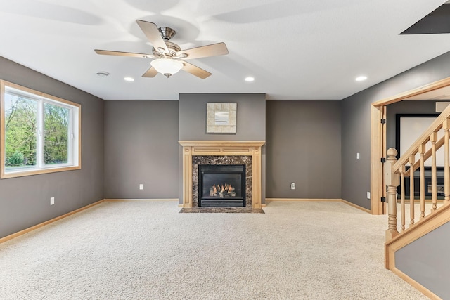 4828 Mason Ave NE, Saint Michael, MN 55376 - unfurnished living room with stairway, carpet, recessed lighting, baseboards, and a premium fireplace