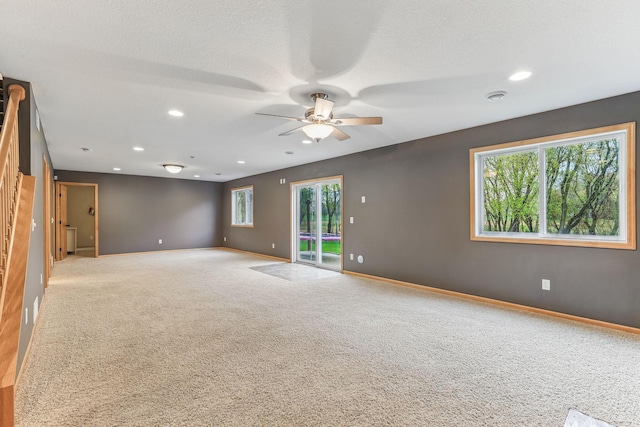 4828 Mason Ave NE, Saint Michael, MN 55376 - carpeted spare room featuring ceiling fan, recessed lighting, and baseboards