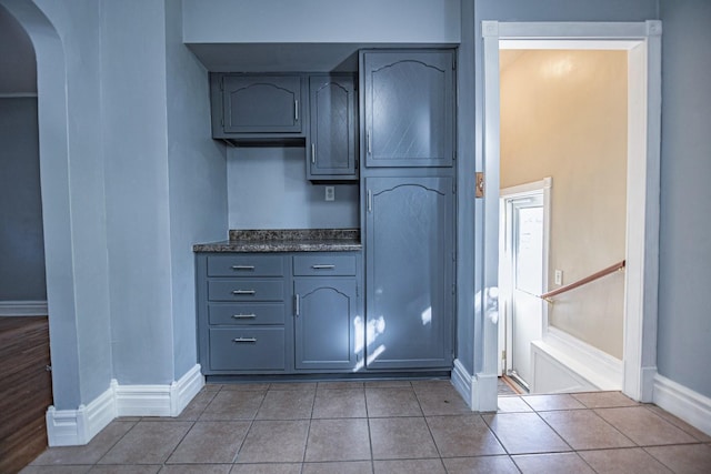 546 2nd St SE, Perham, MN 56573 - bathroom featuring baseboards and tile patterned floors