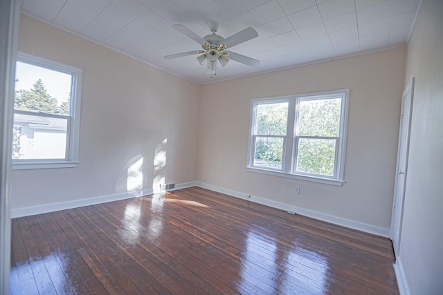 546 2nd St SE, Perham, MN 56573 - empty room featuring hardwood / wood-style flooring, a ceiling fan, and baseboards