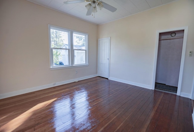 546 2nd St SE, Perham, MN 56573 - unfurnished room featuring a ceiling fan, dark wood-style flooring, baseboards, and crown molding