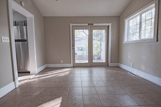 546 2nd St SE, Perham, MN 56573 - tiled empty room featuring baseboards and a smoke detector