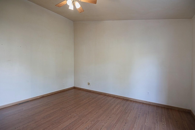 546 2nd St SE, Perham, MN 56573 - empty room with ceiling fan, wood finished floors, and baseboards