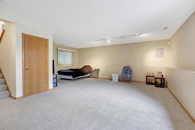 living area featuring stairs, carpet flooring, electric panel, and baseboards
