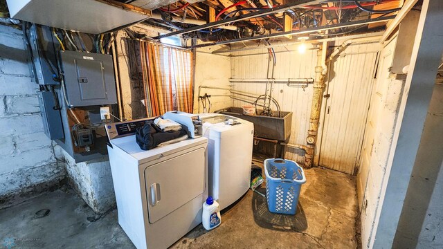 728 8th St N, Fargo, ND 58102 - washroom featuring electric panel and washer and dryer