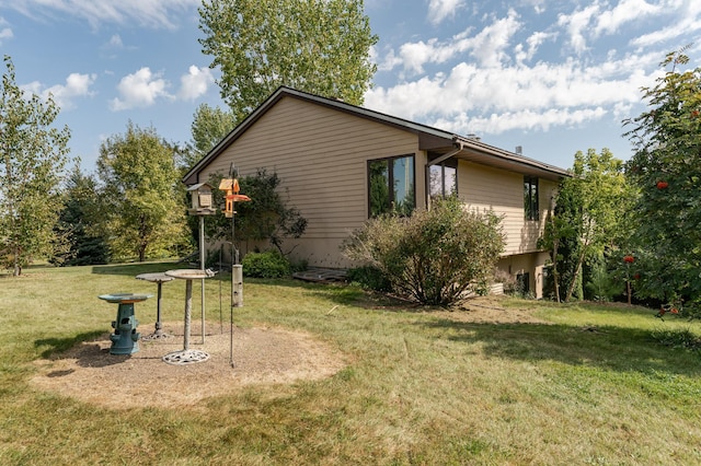 42340 County 50th Blvd, Minneola Twp, MN 55983 - view of side of home featuring a lawn