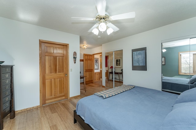 42340 County 50th Blvd, Minneola Twp, MN 55983 - bedroom featuring light wood-type flooring and ceiling fan