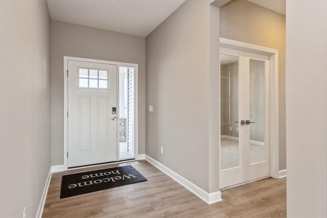 14965 105th Pl N, Maple Grove, MN 55369 - entrance foyer with light wood-type flooring and baseboards