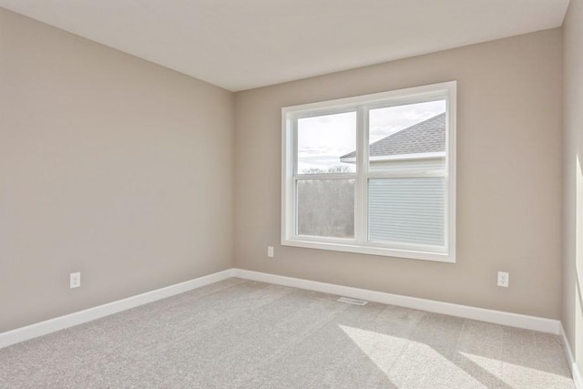 14965 105th Pl N, Maple Grove, MN 55369 - empty room featuring baseboards and light colored carpet