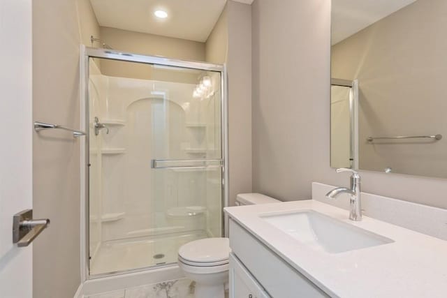 14965 105th Pl N, Maple Grove, MN 55369 - bathroom featuring toilet, a stall shower, marble finish flooring, and vanity