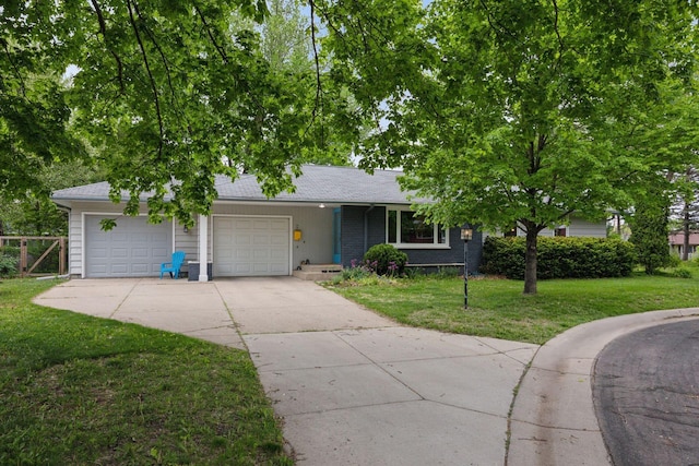 5 Hillside Ct, Northfield, MN 55057 - view of front facade featuring driveway, a garage, roof with shingles, and brick siding