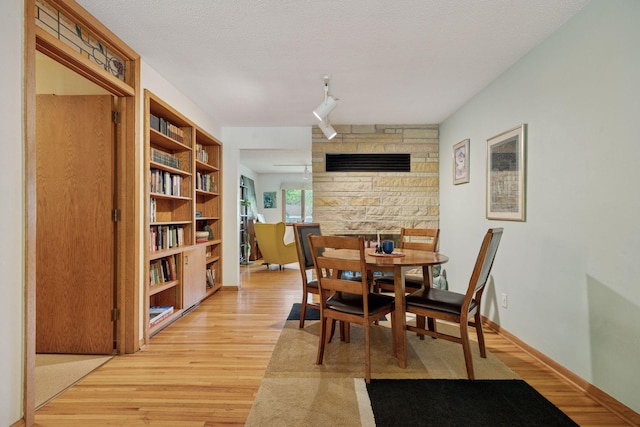 5 Hillside Ct, Northfield, MN 55057 - dining area with light wood finished floors and a textured ceiling