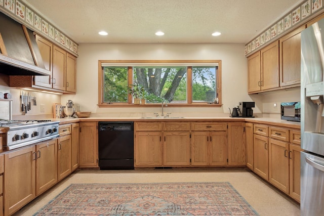 5 Hillside Ct, Northfield, MN 55057 - kitchen with stainless steel appliances, a sink, wall chimney exhaust hood, a textured ceiling, and recessed lighting