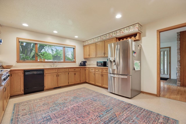 5 Hillside Ct, Northfield, MN 55057 - kitchen featuring stainless steel refrigerator with ice dispenser, dishwasher, a sink, recessed lighting, and light countertops