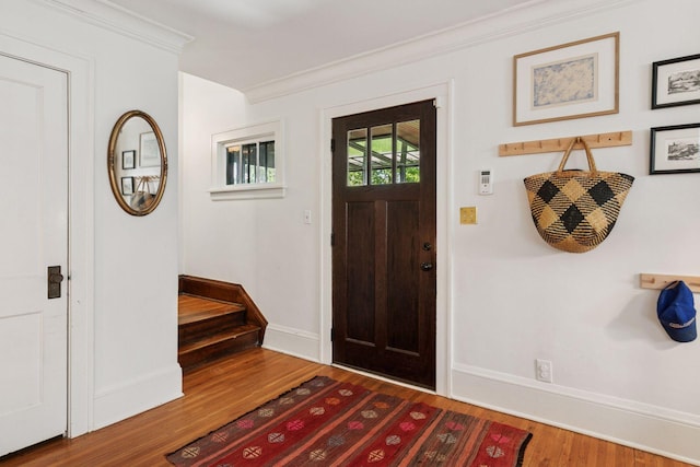 1310 Fairmount Ave, Saint Paul, MN 55105 - foyer entrance featuring wood finished floors, ornamental molding, and baseboards