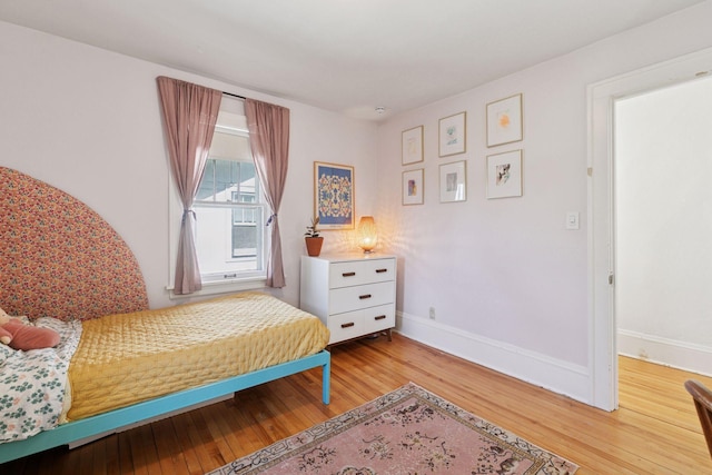 1310 Fairmount Ave, Saint Paul, MN 55105 - bedroom featuring hardwood / wood-style floors and baseboards