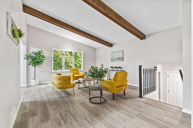 228 16th Ave SW, New Brighton, MN 55112 - sitting room with an upstairs landing, wood finished floors, and baseboards