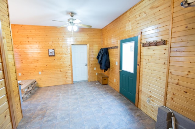 2758 220th St, Madison, MN 56256 - foyer entrance featuring ceiling fan and wood walls
