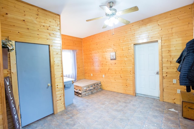 2758 220th St, Madison, MN 56256 - unfurnished bedroom with wooden walls and ceiling fan
