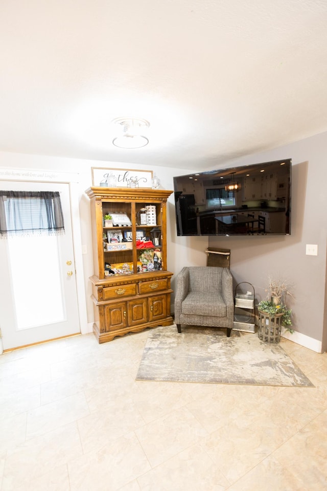 2758 220th St, Madison, MN 56256 - living area with baseboards and tile patterned floors
