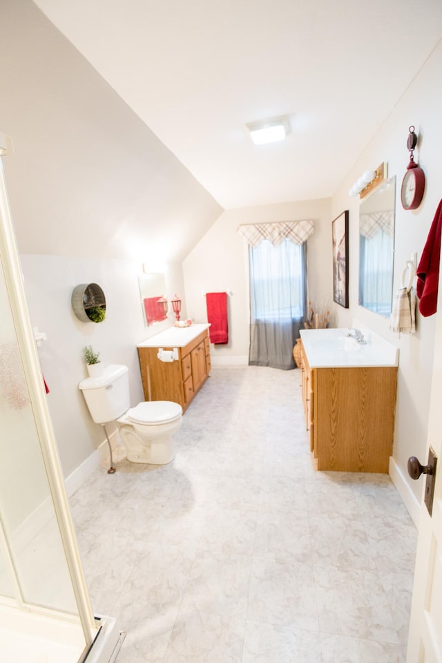 2758 220th St, Madison, MN 56256 - bathroom featuring vanity, a stall shower, lofted ceiling, and toilet