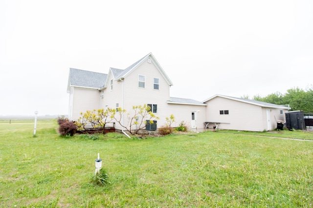 2758 220th St, Madison, MN 56256 - back of house featuring a yard and cooling unit