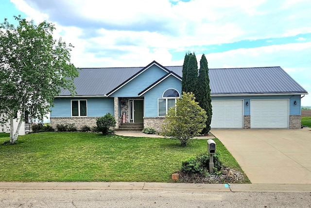 213 Park Dr, Lewiston, MN 55952 - ranch-style house with brick siding, a garage, concrete driveway, and metal roof